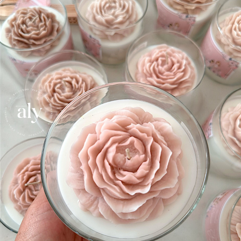 Vela peonia en frasco